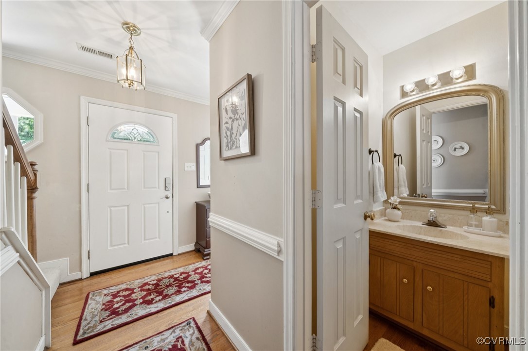 3000 Cove Ridge Road Midlothian, VA 23112 - Photo 27 of 47 a bathroom with a sink a mirror and a shower