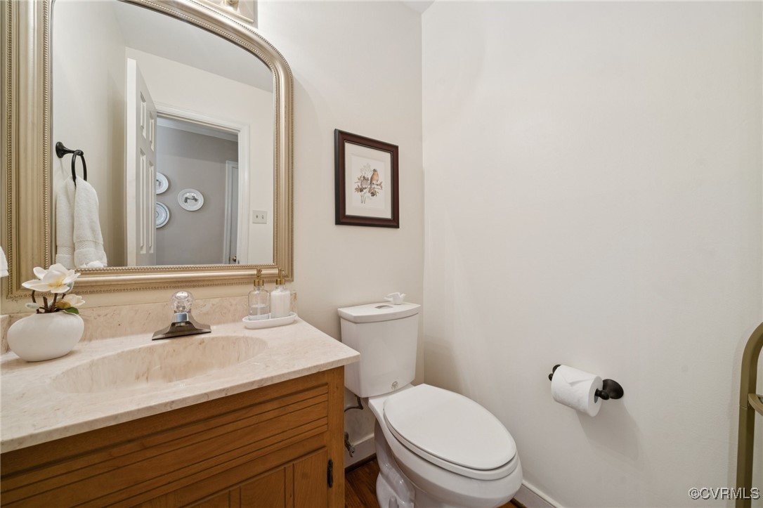 3000 Cove Ridge Road Midlothian, VA 23112 - Photo 28 of 47 a bathroom with a granite countertop sink mirror and toilet