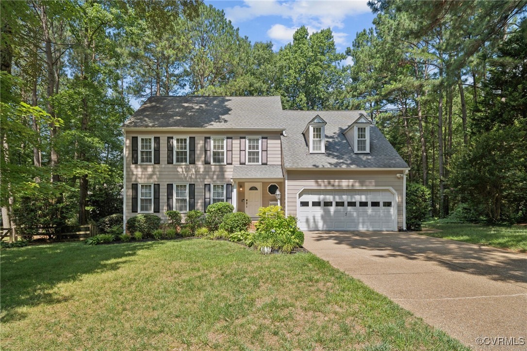 3000 Cove Ridge Road Midlothian, VA 23112 - Photo 3 of 47 a front view of a house with garden