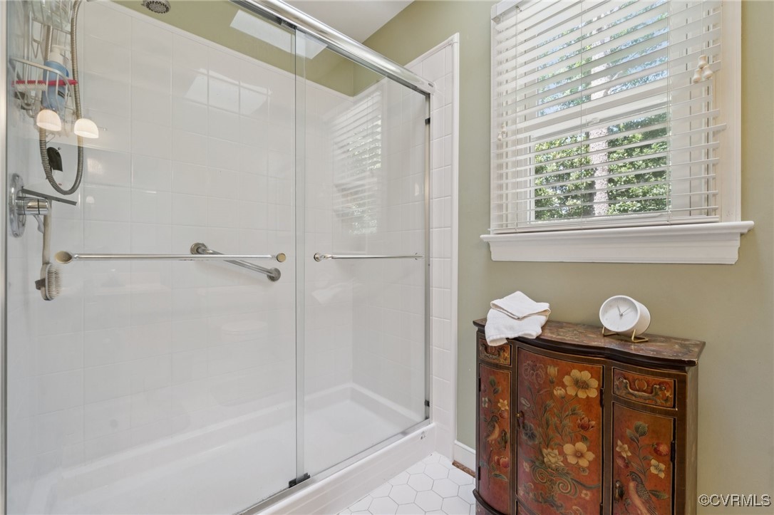 3000 Cove Ridge Road Midlothian, VA 23112 - Photo 31 of 47 a bathroom with a shower a mirror and a shower