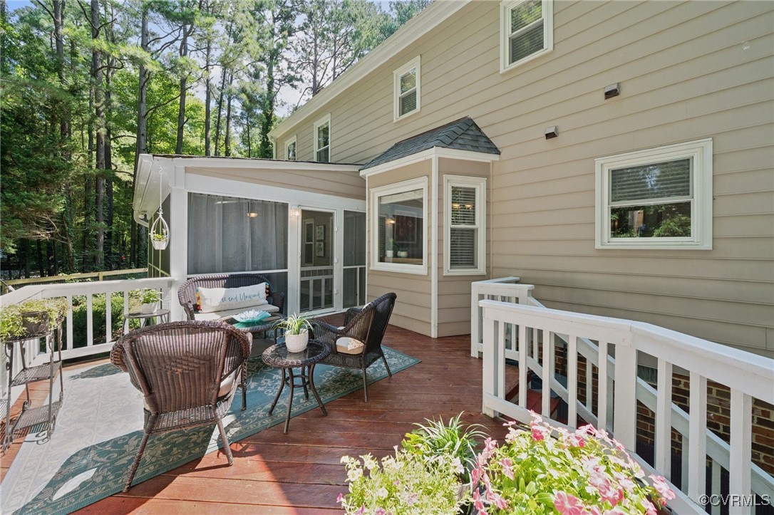 3000 Cove Ridge Road Midlothian, VA 23112 - Photo 42 of 47 a view of a patio with a table and chairs