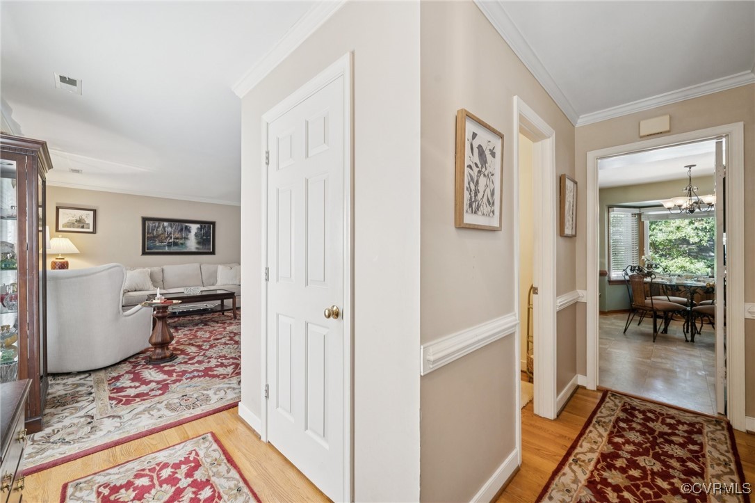 3000 Cove Ridge Road Midlothian, VA 23112 - Photo 6 of 47 a view of a hallway with living room and wooden floor