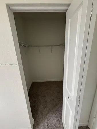 an empty room with closet