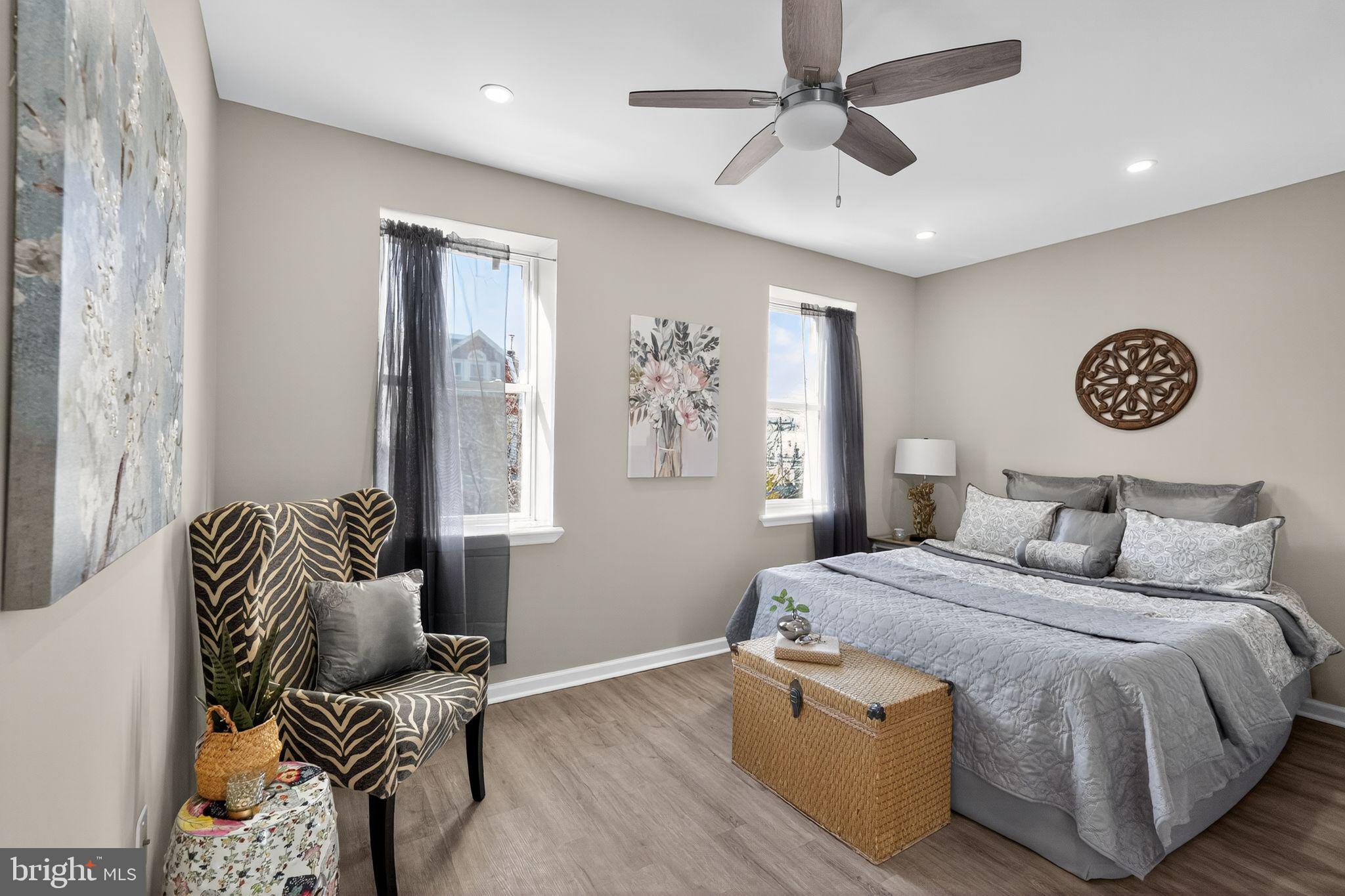 5335 Wakefield Street Philadelphia, PA 19144 - Photo 12 of 30 a bedroom with a bed and wooden floor