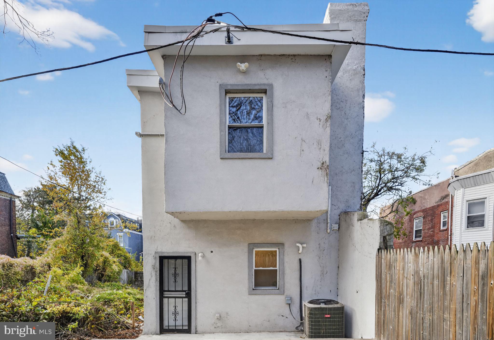 5335 Wakefield Street Philadelphia, PA 19144 - Photo 25 of 30 a front view of a house with a garage