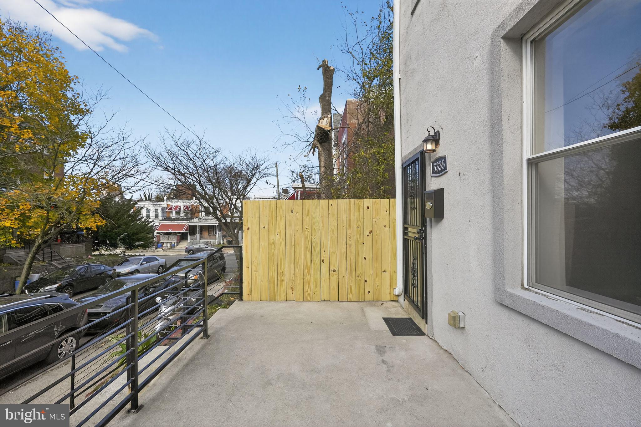 5335 Wakefield Street Philadelphia, PA 19144 - Photo 28 of 30 a view of a house with backyard and trees