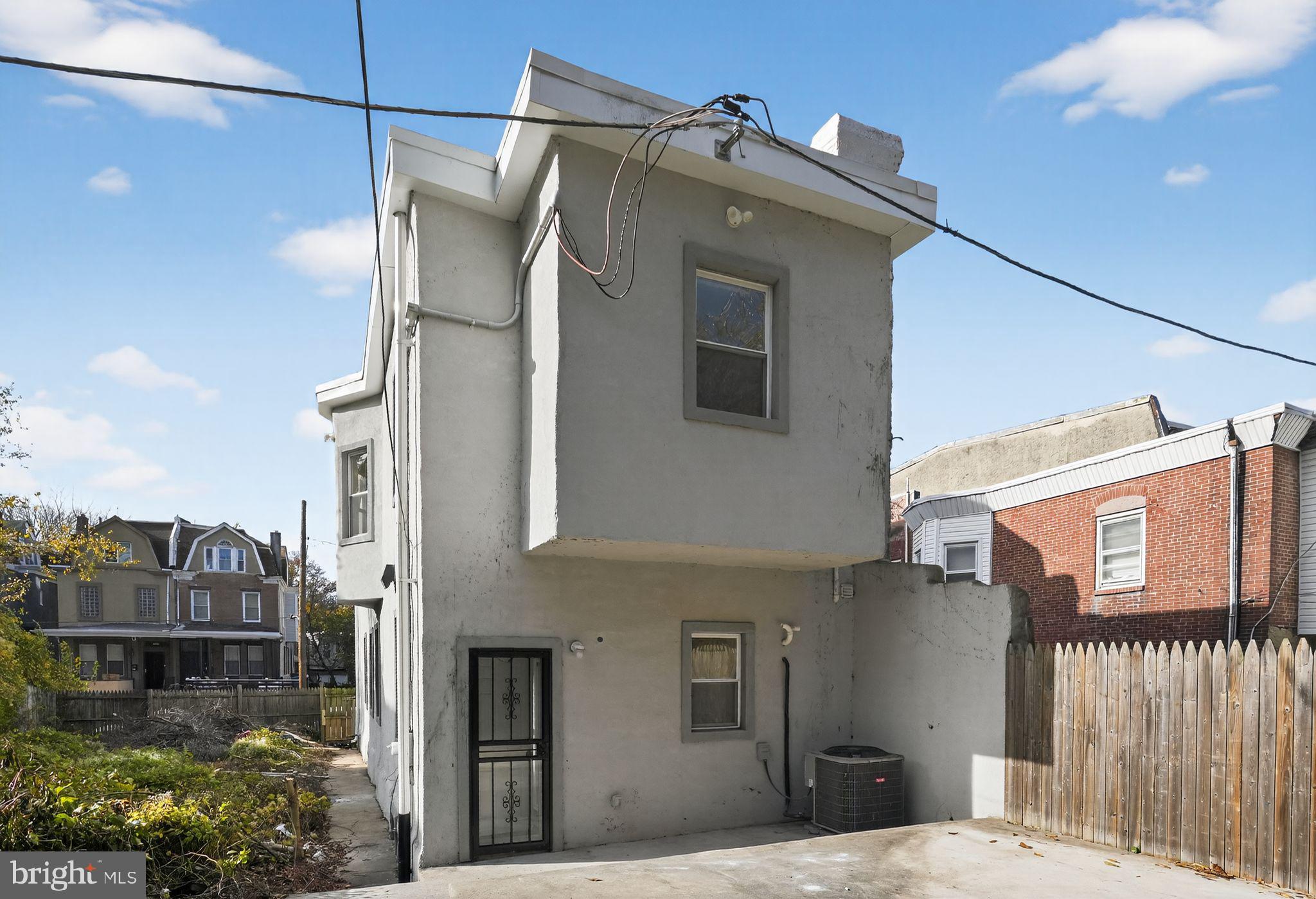 5335 Wakefield Street Philadelphia, PA 19144 - Photo 29 of 30 a view of a house with a small yard