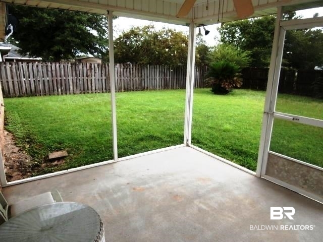 16976 Sugar Loop Foley, AL 36535 - Photo 13 of 16 Unfurnished sunroom with ceiling fan