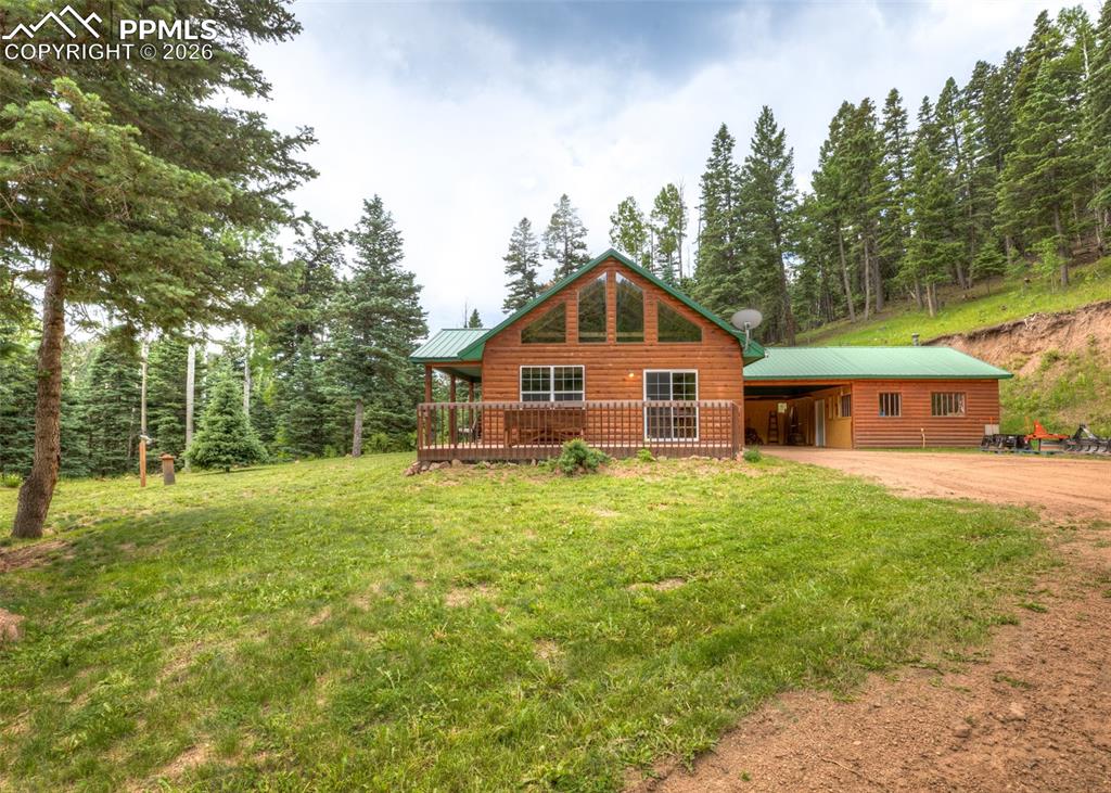 331 Westcliffe Drive Rye, CO 81069 - Photo 12 of 50 a front view of a house with a yard