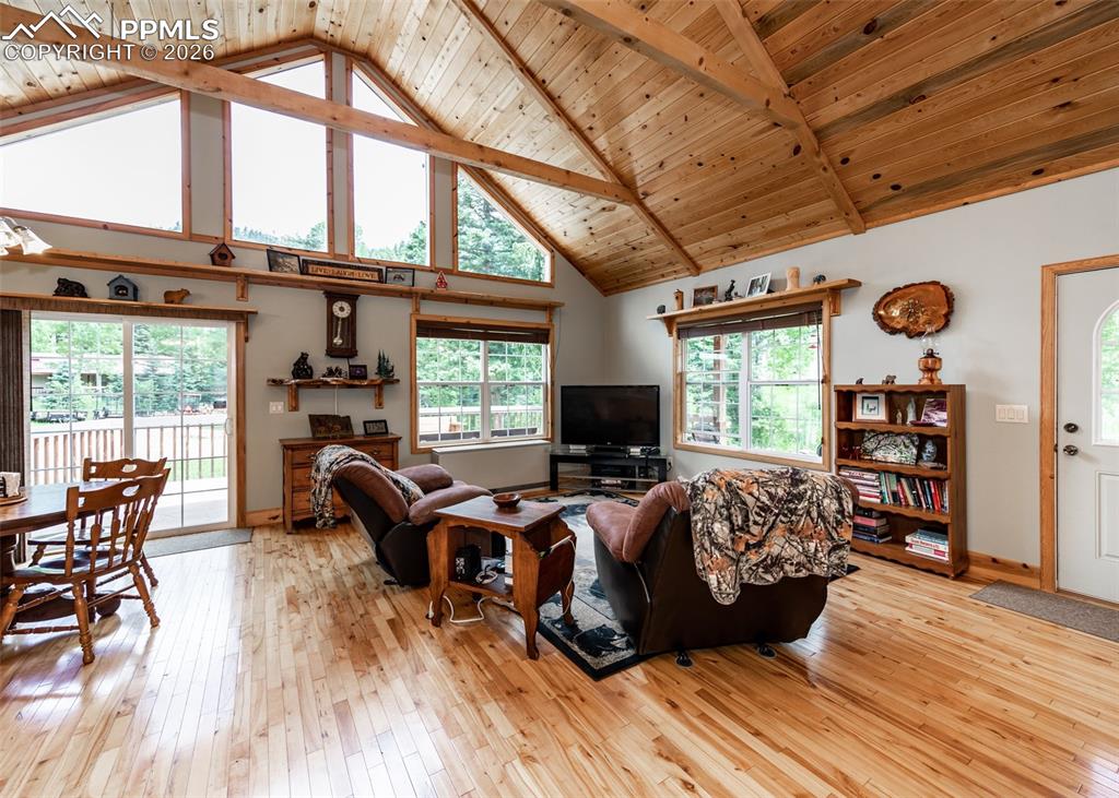 331 Westcliffe Drive Rye, CO 81069 - Photo 16 of 50 a bed room with furniture and a large window