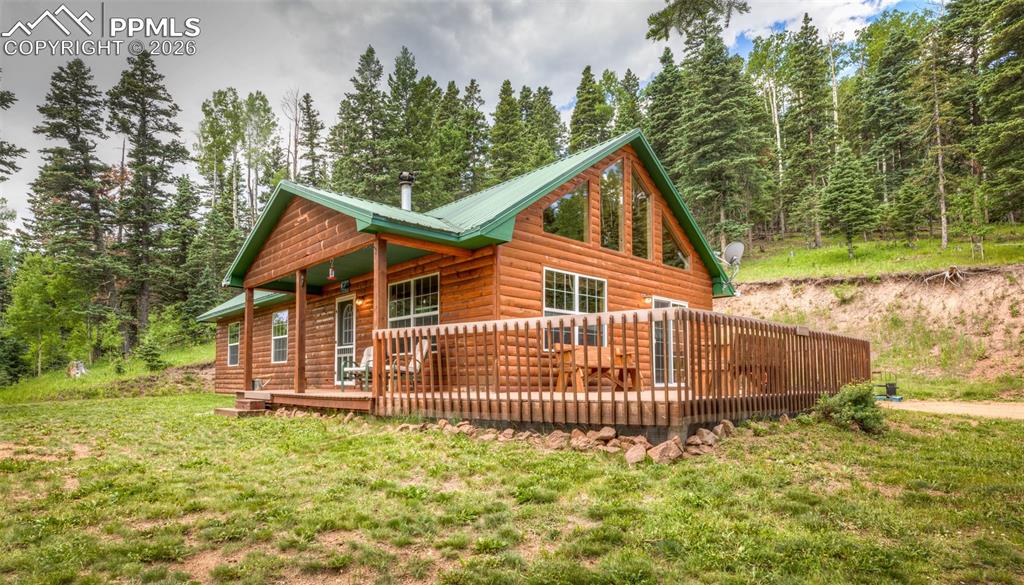 331 Westcliffe Drive Rye, CO 81069 - Photo 7 of 50 a view of a house with a yard