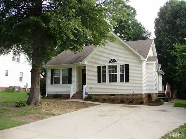 4619 Sinclair Drive Raleigh, NC 27616 - Photo 1 of 9 a front view of a house with a yard and garage