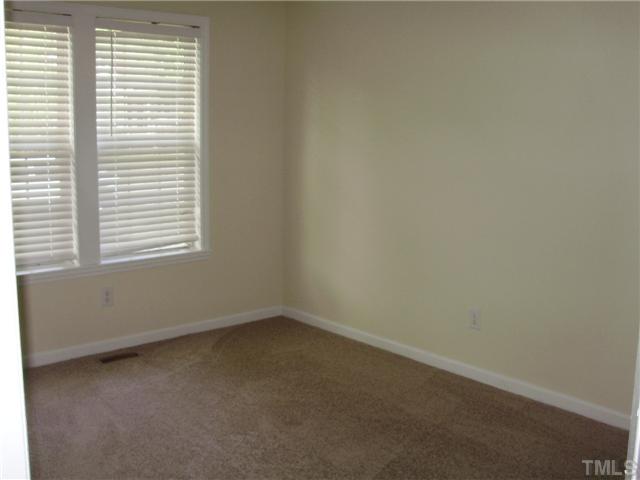 4619 Sinclair Drive Raleigh, NC 27616 - Photo 7 of 9 an empty room with a window