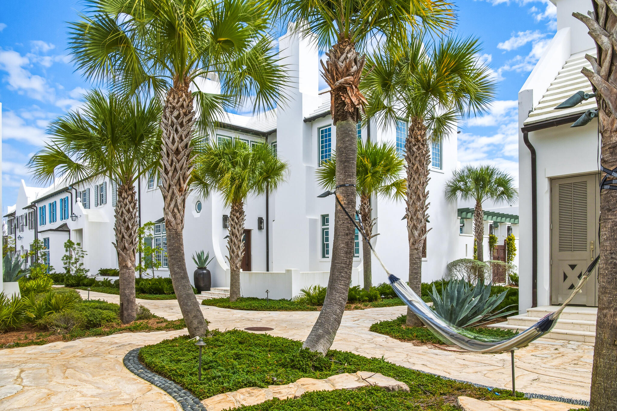 36 Sea Star Ct Inlet Beach Inlet Beach, FL 32461 - Photo 2 of 75 a front view of multi story residential apartment building with yard and green space