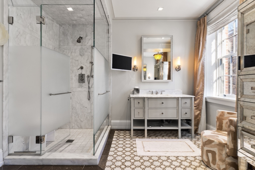 25 Beacon Street, Unit 4 Boston, MA 02108 - Photo 23 of 41 a bathroom with a sink a toilet and shower
