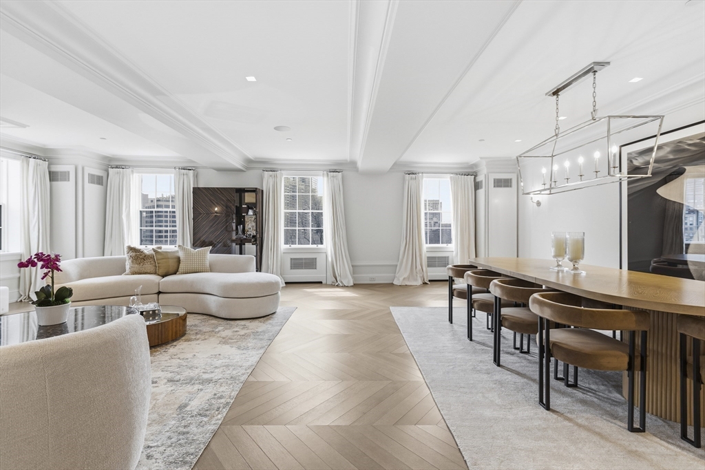 25 Beacon Street, Unit 4 Boston, MA 02108 - Photo 4 of 41 a living room with furniture and a large window