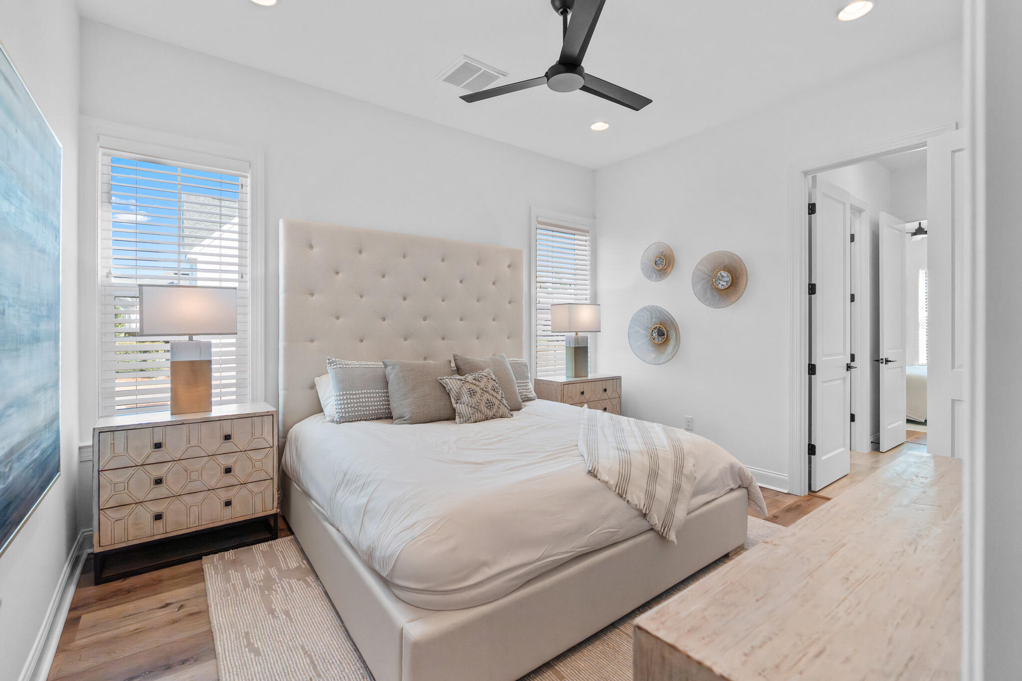 90 Suwannee Dr Inlet Beach Inlet Beach, FL 32461 - Photo 13 of 59 a bedroom with a bed and a chandelier