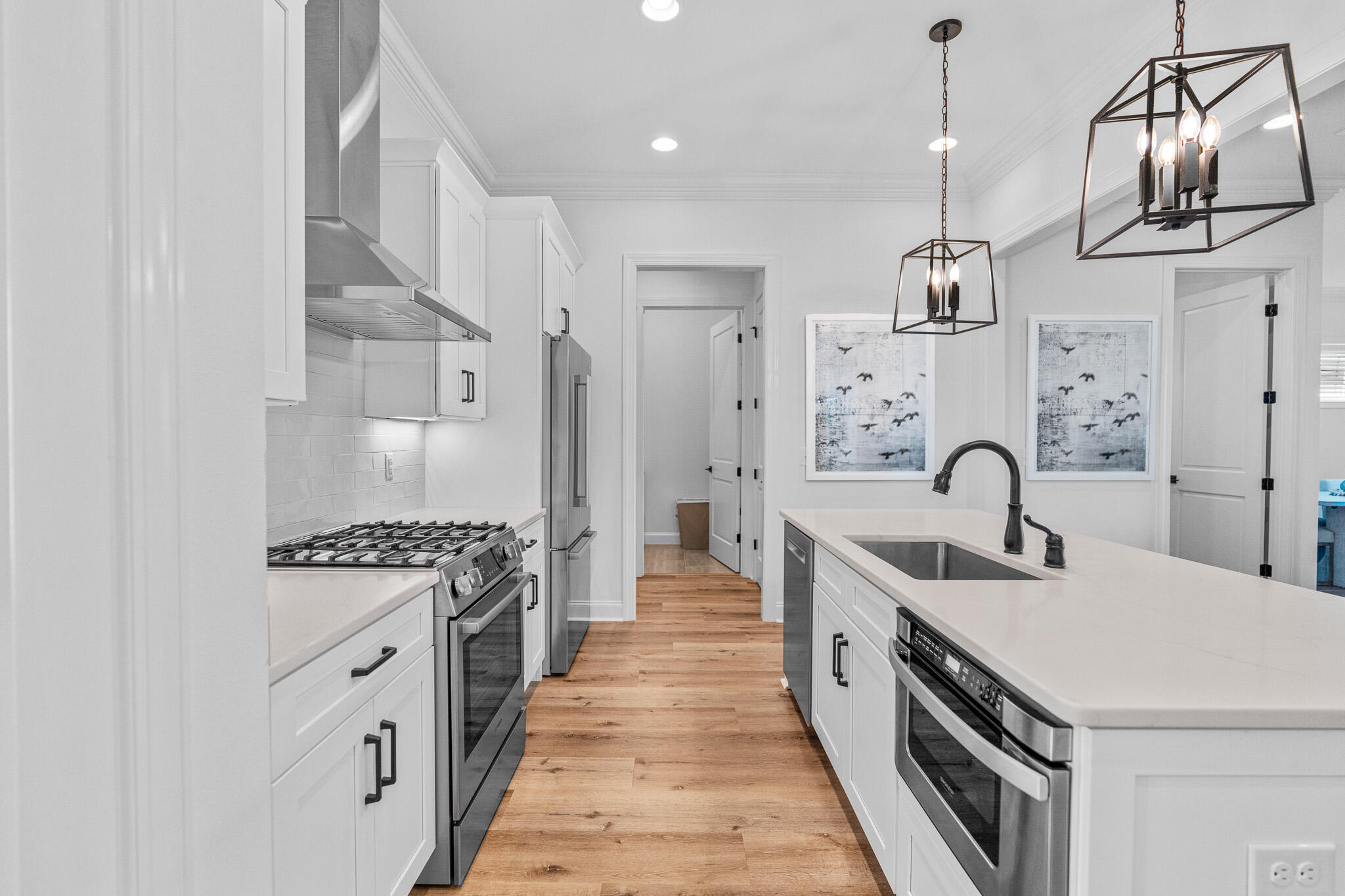 90 Suwannee Dr Inlet Beach Inlet Beach, FL 32461 - Photo 16 of 59 a kitchen with stainless steel appliances granite countertop a sink a stove and a refrigerator