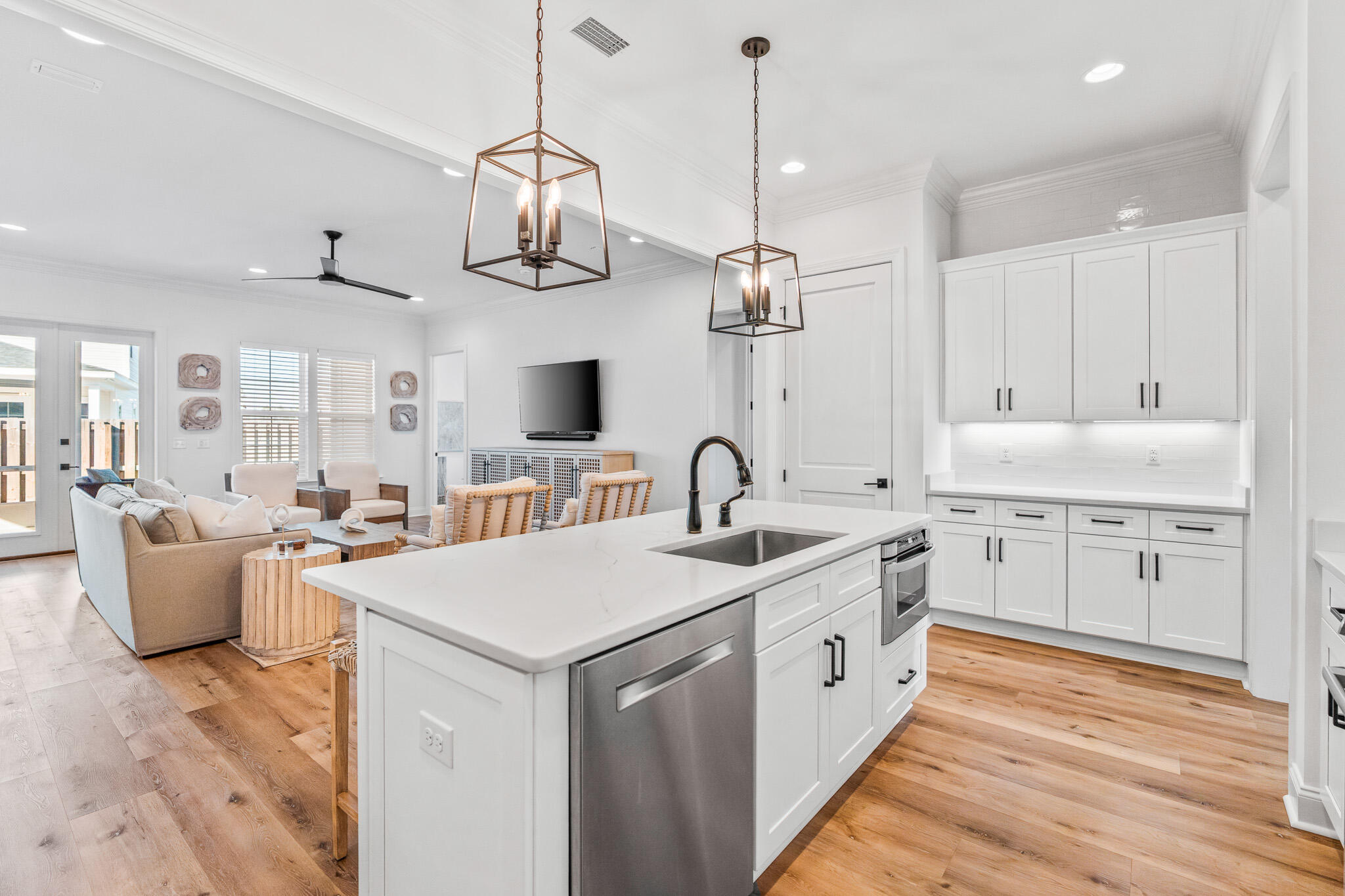 90 Suwannee Dr Inlet Beach Inlet Beach, FL 32461 - Photo 18 of 59 a large white kitchen with stainless steel appliances lots of counter space and wooden floor