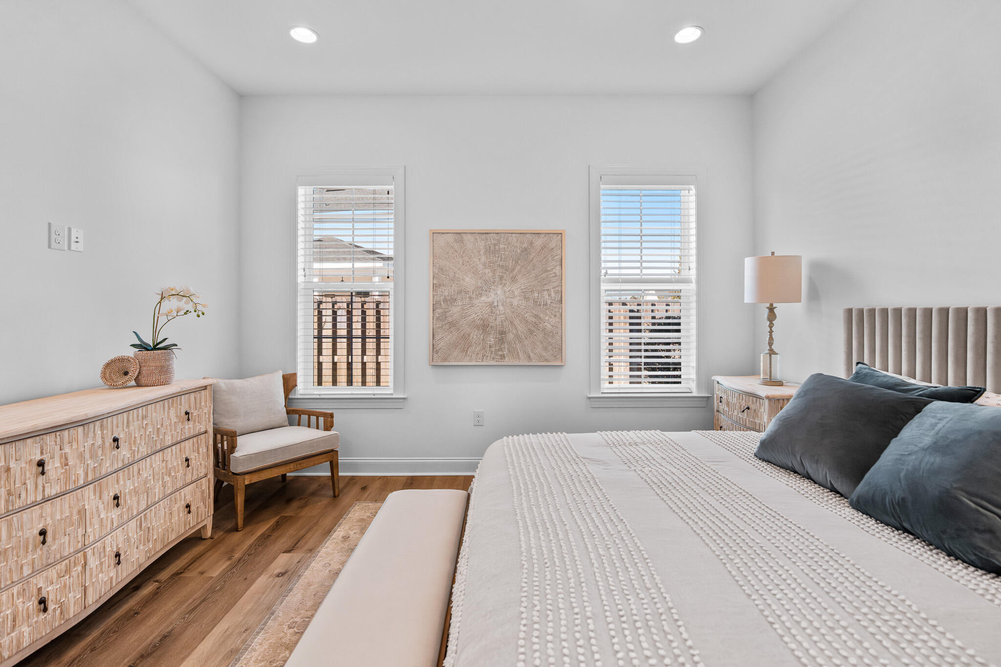 90 Suwannee Dr Inlet Beach Inlet Beach, FL 32461 - Photo 33 of 59 a bedroom with a bed and a dresser with wooden floor