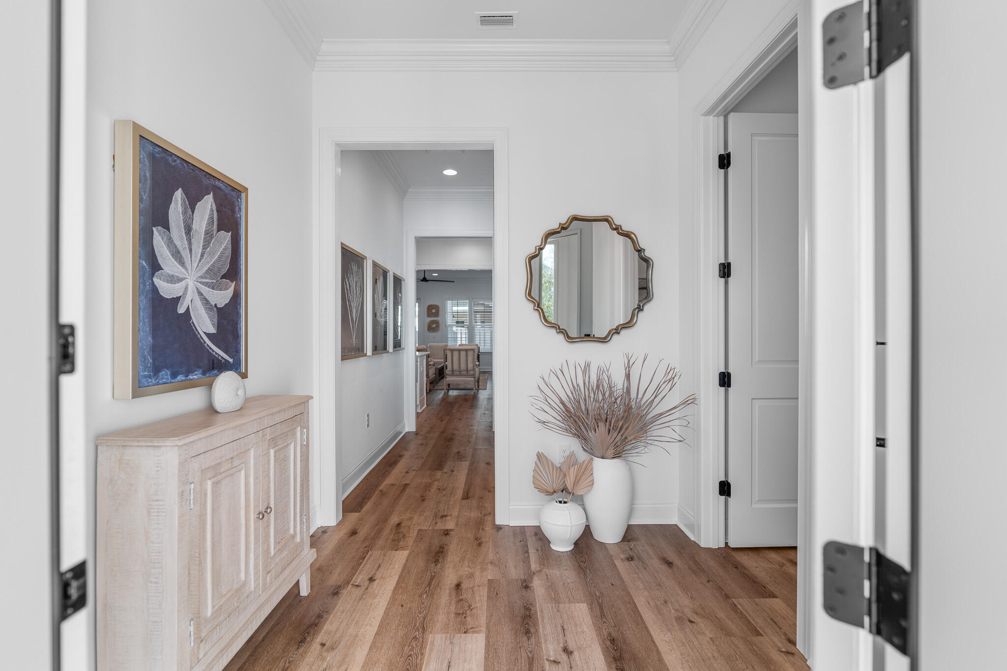 90 Suwannee Dr Inlet Beach Inlet Beach, FL 32461 - Photo 5 of 59 a view of a hallway with wooden floor and entryway