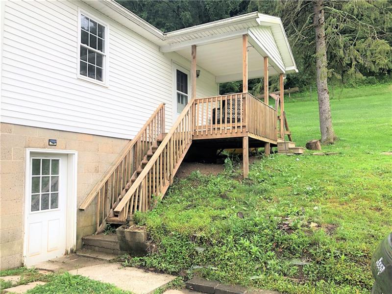 374 Garretts Run Road Kittanning, PA 16201 - Photo 17 of 24 Stairs and porch leading to garage apartment