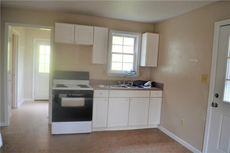 374 Garretts Run Road Kittanning, PA 16201 - Photo 21 of 24 Apartment kitchen and laundry area