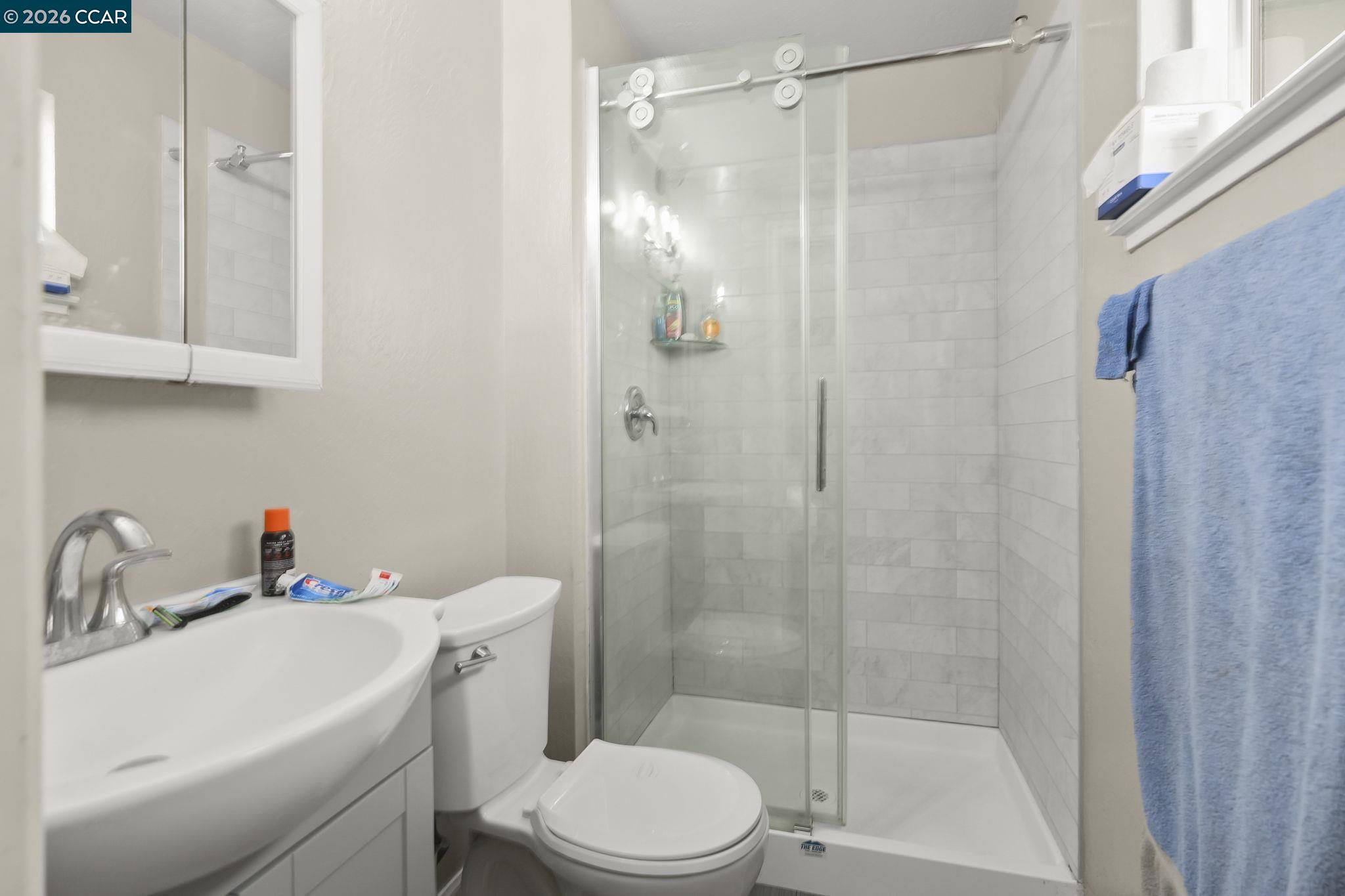 3922 Bayview Circle Concord, CA 94520 - Photo 17 of 30 a bathroom with a sink toilet and shower