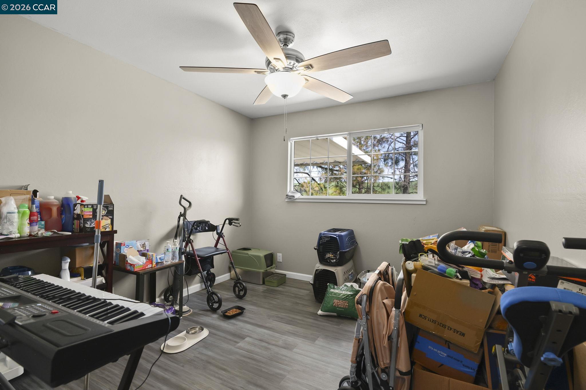 3922 Bayview Circle Concord, CA 94520 - Photo 18 of 30 a view of a workspace with furniture and wooden floor