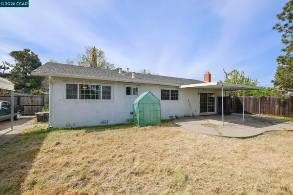 a view of a backyard with porch