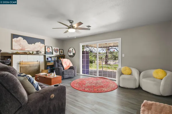a bed room with furniture and a chandelier