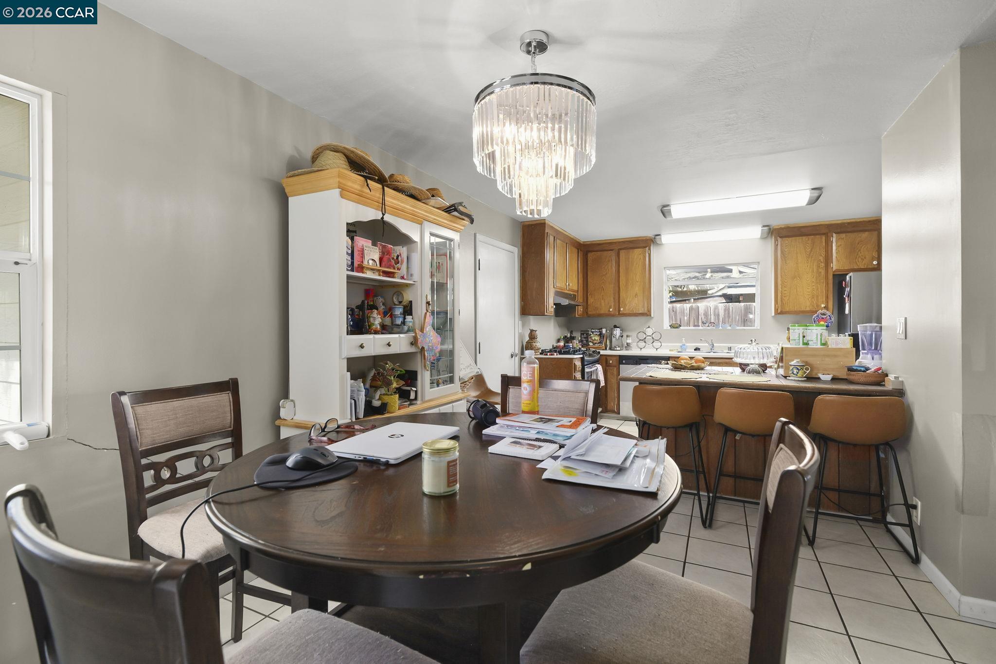 3922 Bayview Circle Concord, CA 94520 - Photo 8 of 30 a view of a dining room with furniture and chandelier