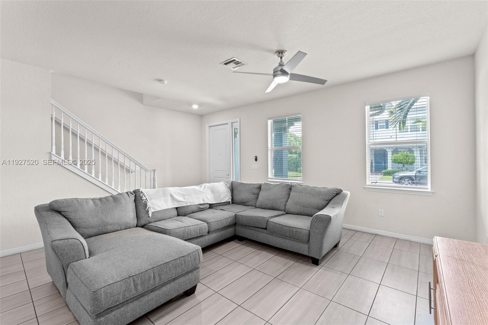1190 Eucalyptus Drive, Unit 5 Hollywood, FL 33021 - Photo 12 of 42 a living room with furniture and a window