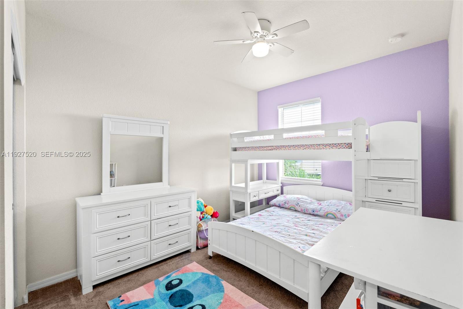 1190 Eucalyptus Drive, Unit 5 Hollywood, FL 33021 - Photo 26 of 42 a bedroom with a bed and a dresser