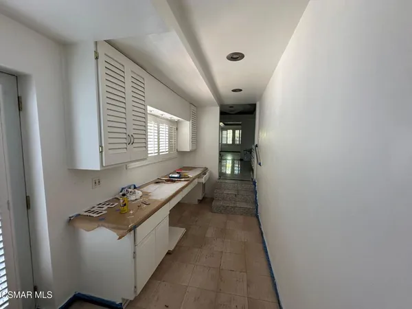 a room with furniture and window