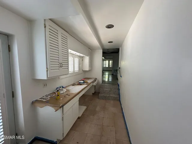 a room with furniture and window