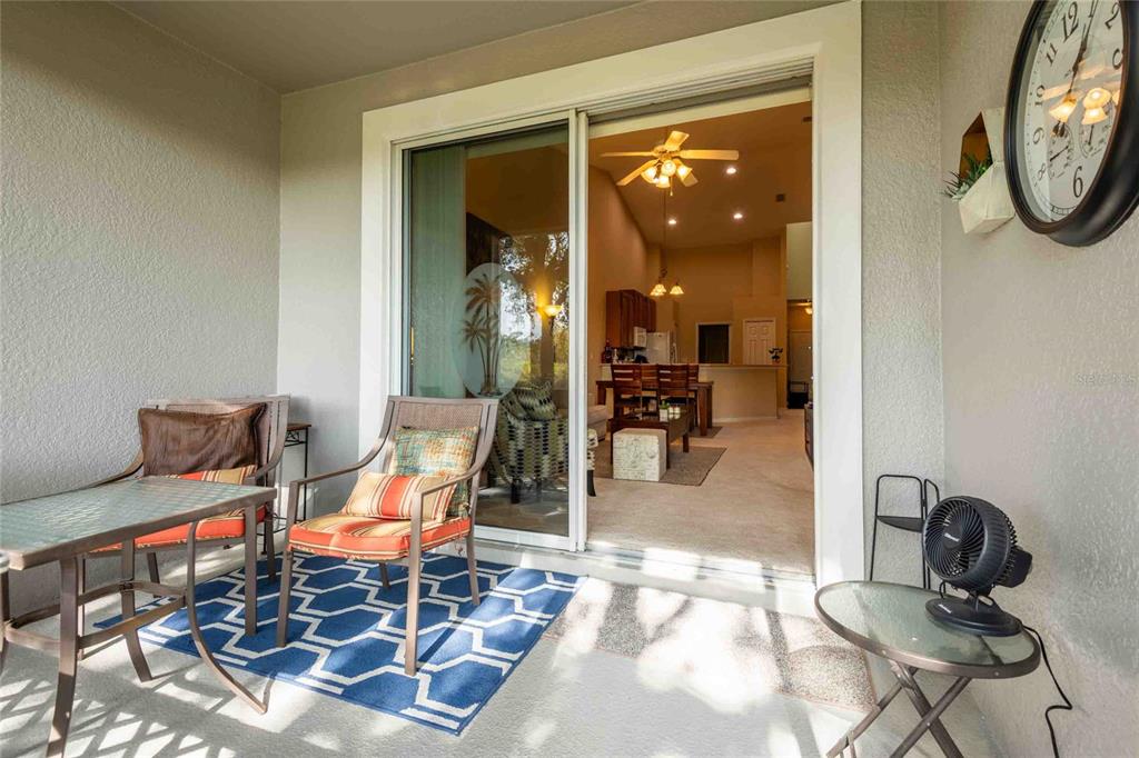 2735 Rutledge Court Winter Haven, FL 33884 - Photo 17 of 42 a view of a livingroom with furniture and a window
