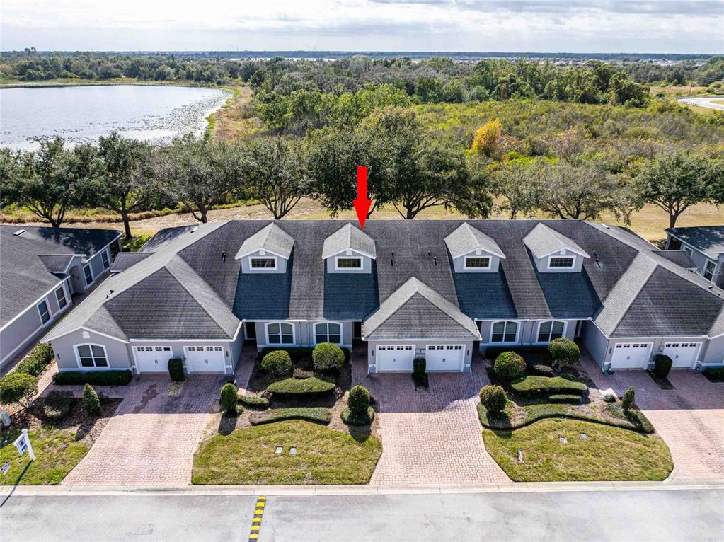 2735 Rutledge Court Winter Haven, FL 33884 - Photo 18 of 42 an aerial view of houses with a lake