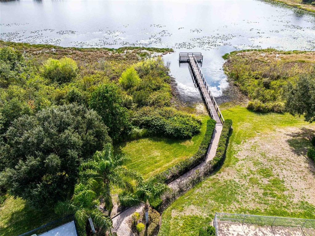 2735 Rutledge Court Winter Haven, FL 33884 - Photo 2 of 42 a view of a lake with a mountain