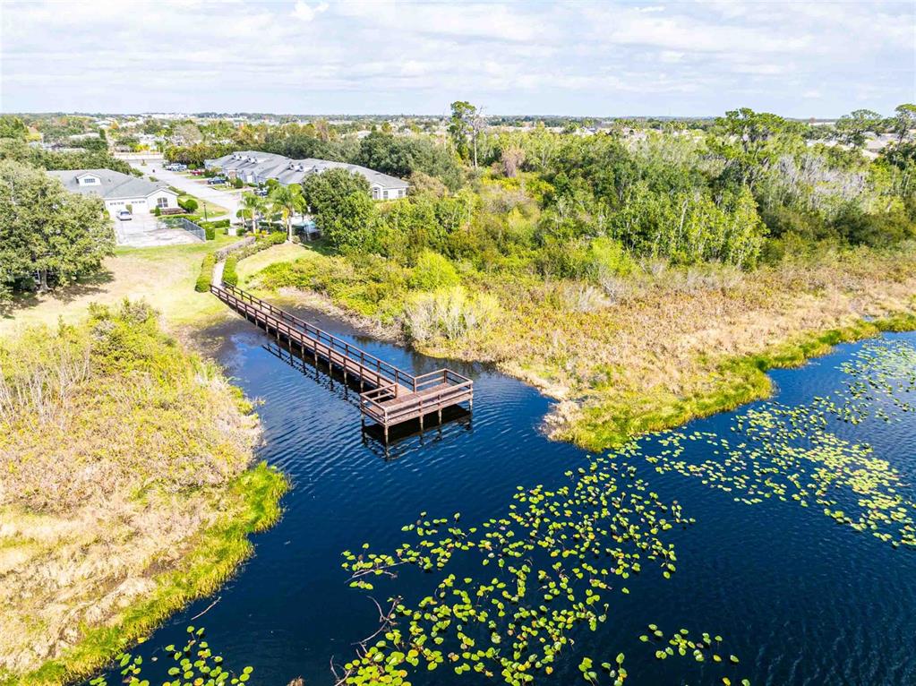 2735 Rutledge Court Winter Haven, FL 33884 - Photo 31 of 42 an aerial view of residential houses with outdoor space
