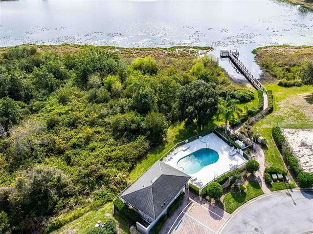 a view of a lake with a big yard