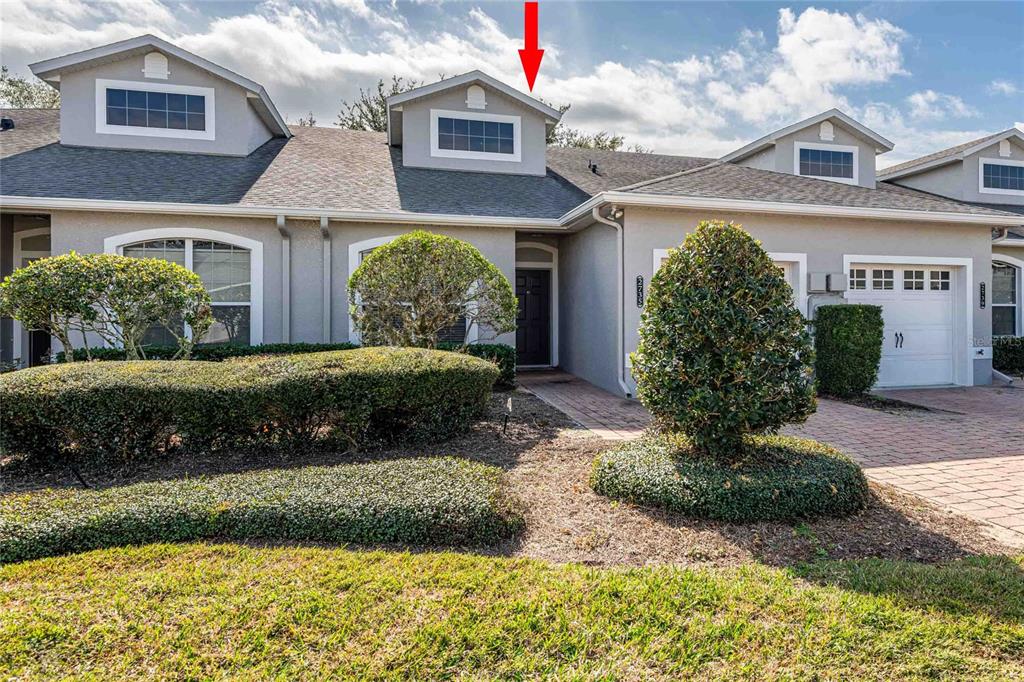 2735 Rutledge Court Winter Haven, FL 33884 - Photo 37 of 42 a front view of a house with a yard