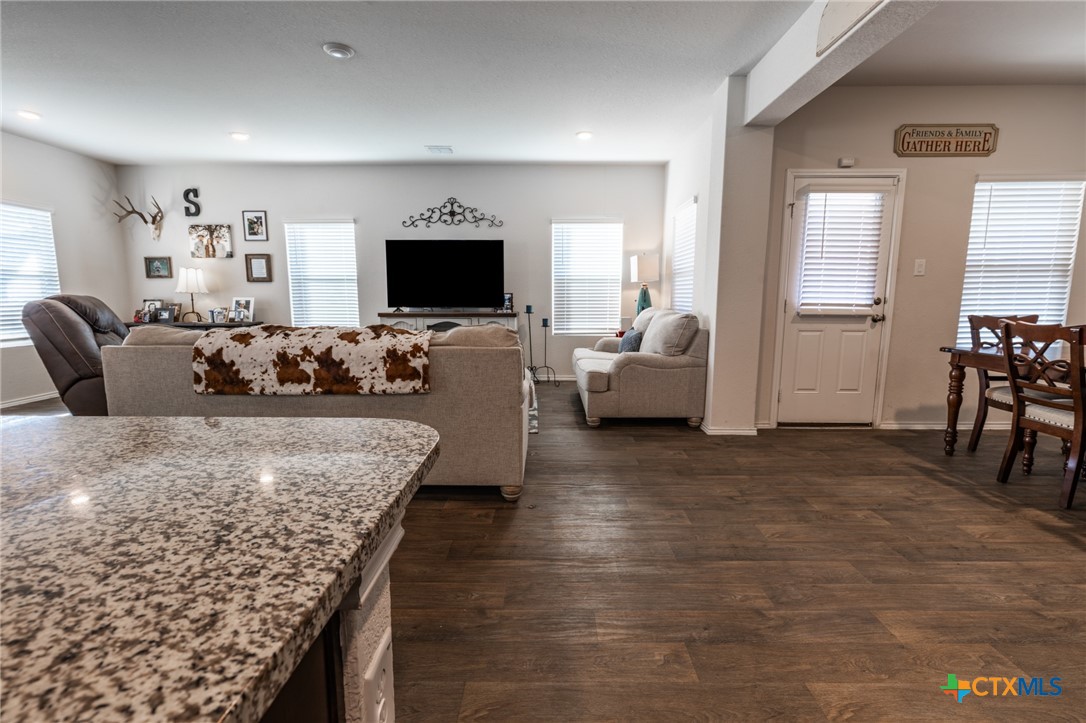 929 Indigo Way Seguin, TX 78155 - Photo 11 of 30 a living room with furniture and a flat screen tv
