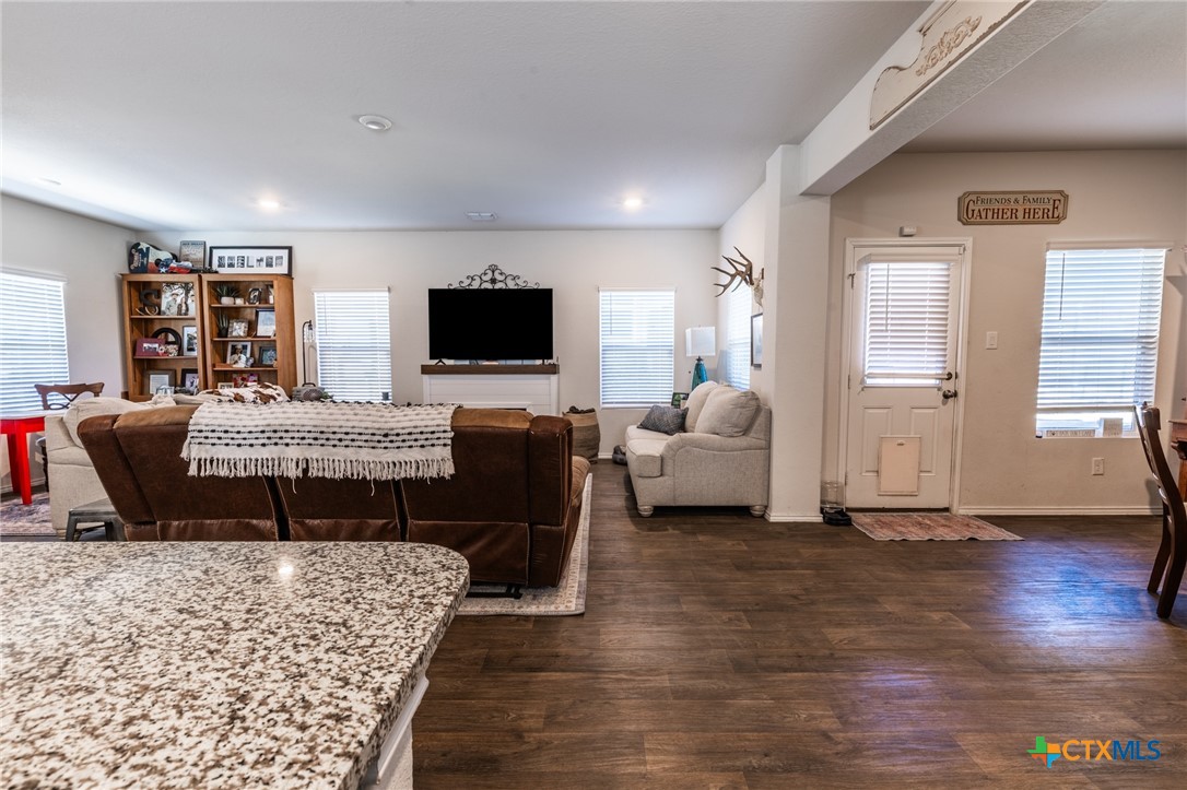 929 Indigo Way Seguin, TX 78155 - Photo 14 of 37 a living room with furniture and a flat screen tv