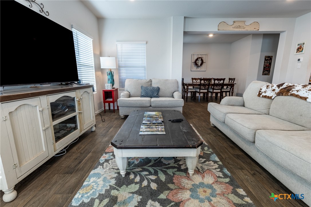 929 Indigo Way Seguin, TX 78155 - Photo 7 of 30 a living room with furniture and a flat screen tv
