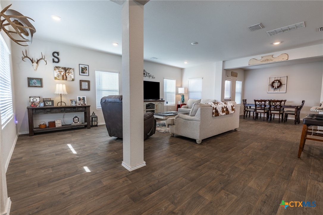 929 Indigo Way Seguin, TX 78155 - Photo 10 of 30 a living room with furniture and a flat screen tv