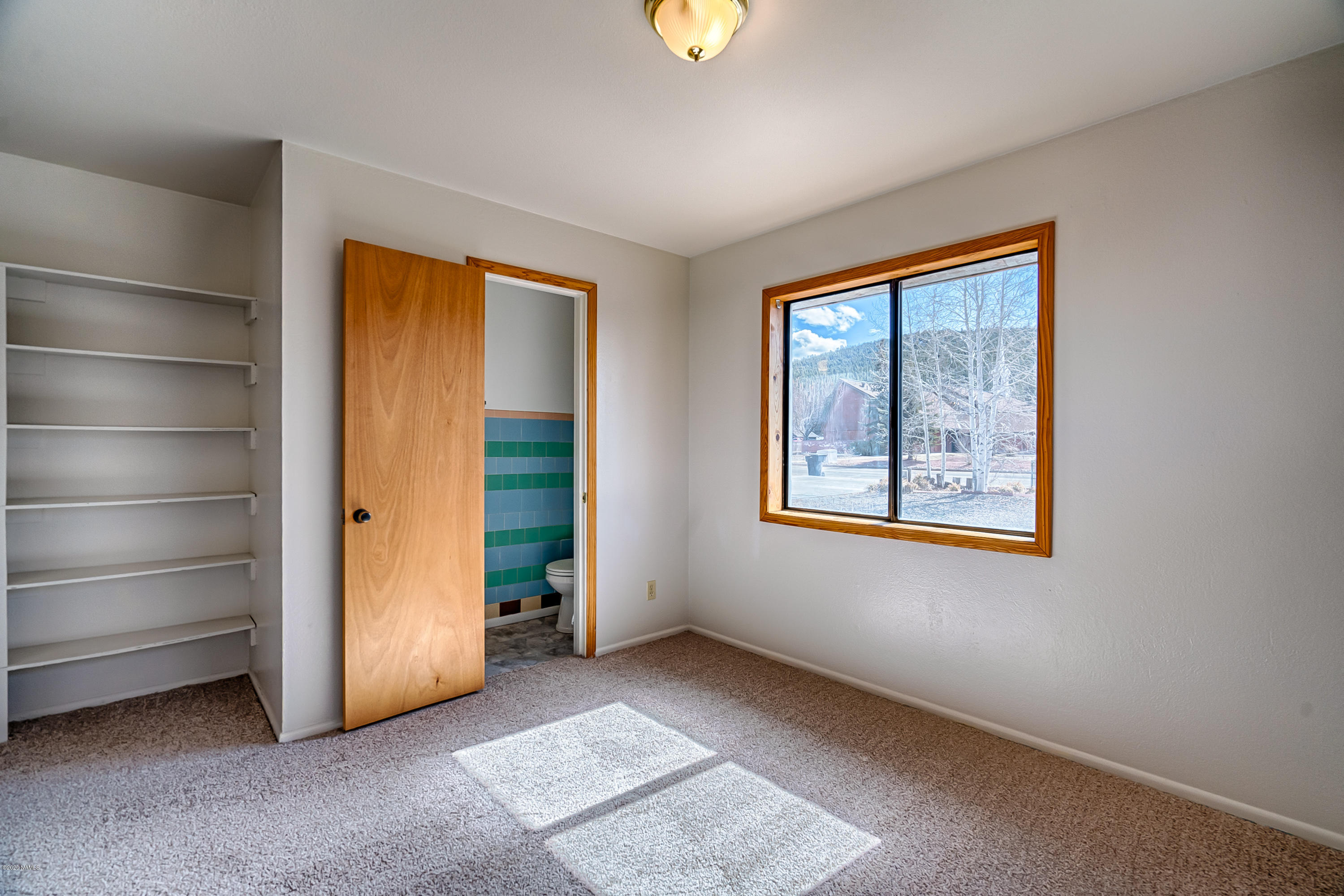 1110 Stockmens Road Williams, AZ 86046 - Photo 12 of 21 2nd Bedroom w 1/2 BA