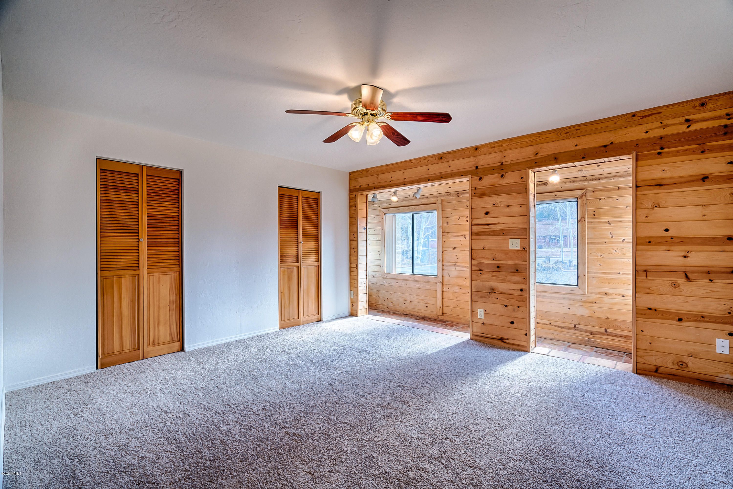 1110 Stockmens Road Williams, AZ 86046 - Photo 9 of 21 Master bedroom w Sunroom