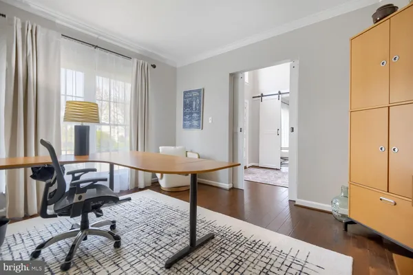a view of a livingroom with furniture and window
