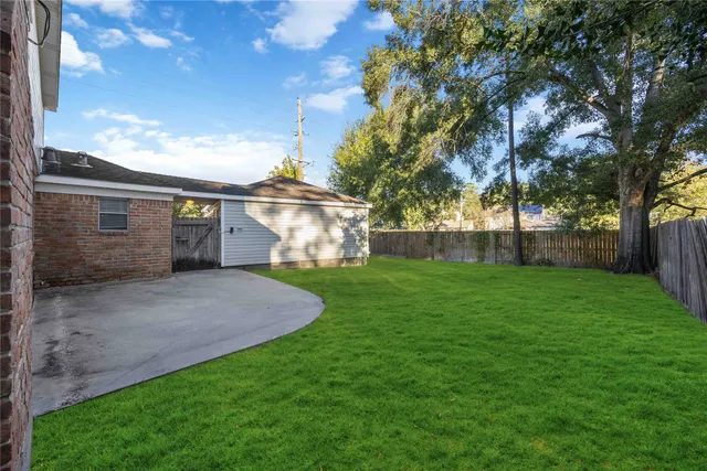 a view of a backyard with a garden
